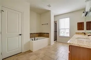 a bathroom with a bathtub