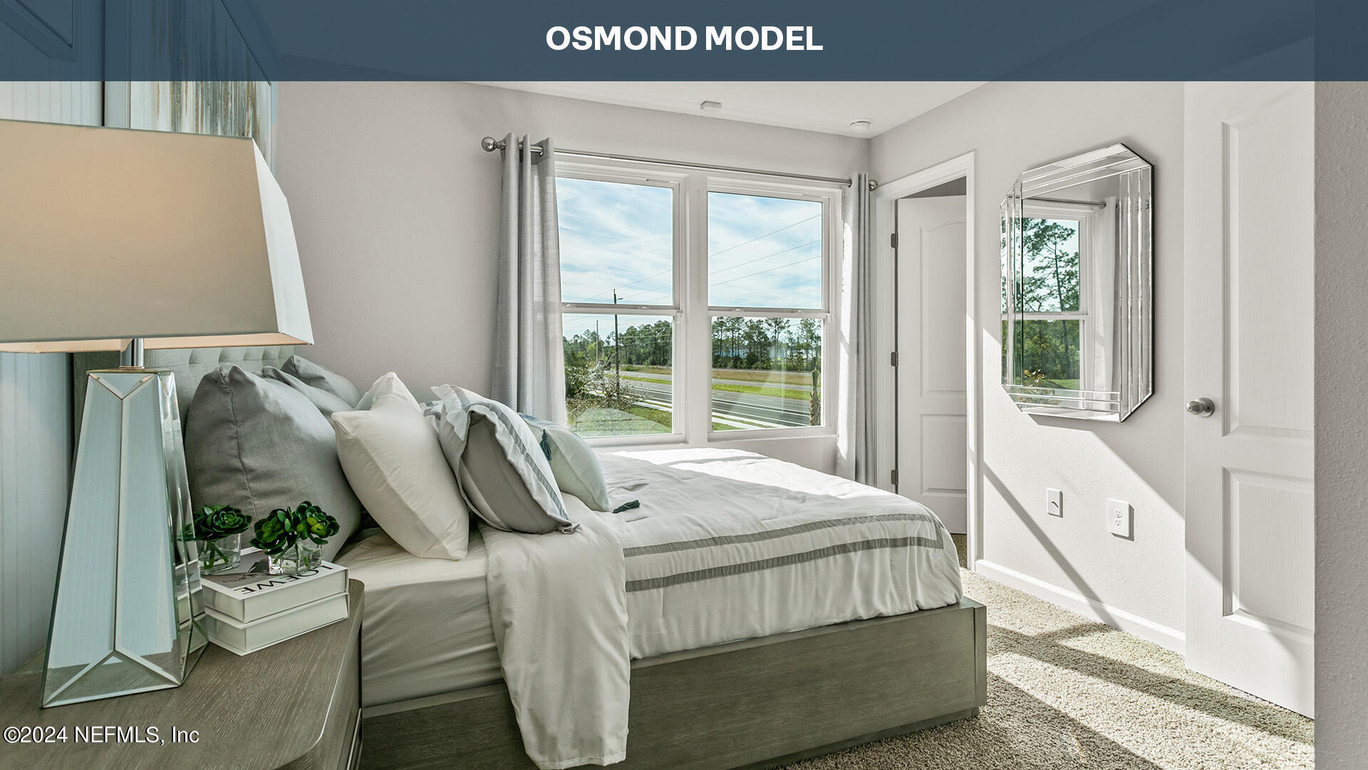 71 Ayamonte Road St. Augustine, FL 32084 - Photo 14 of 34 a bedroom with a bed and window