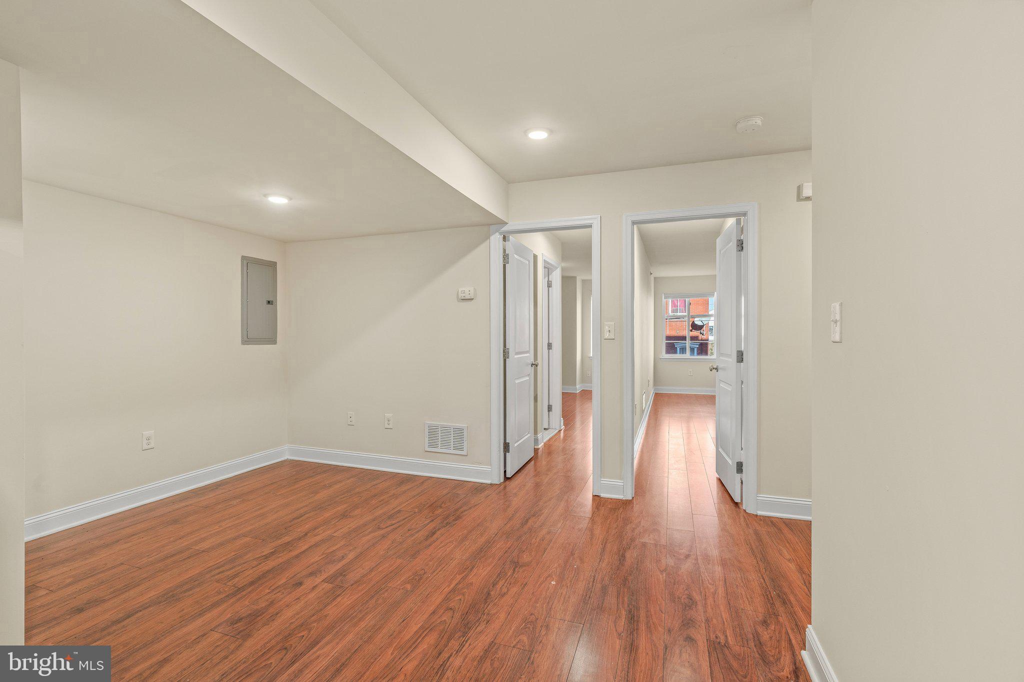 1724 Master Street, Unit C Philadelphia, PA 19121 - Photo 3 of 24 a view of empty room with wooden floor
