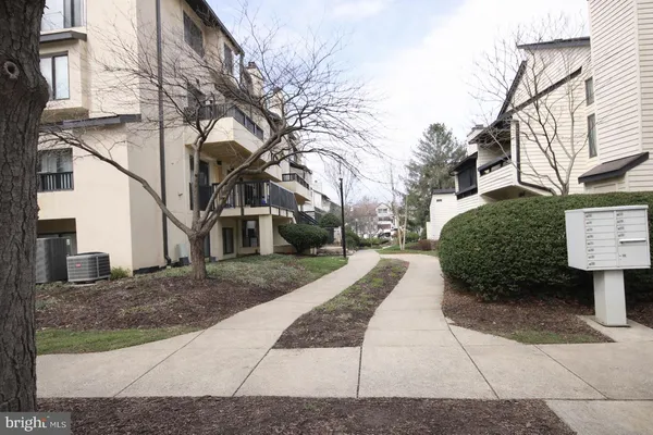 a view of yard with patio