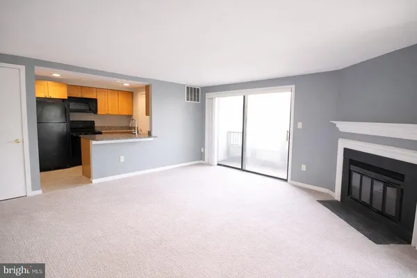a view of a livingroom with a fireplace