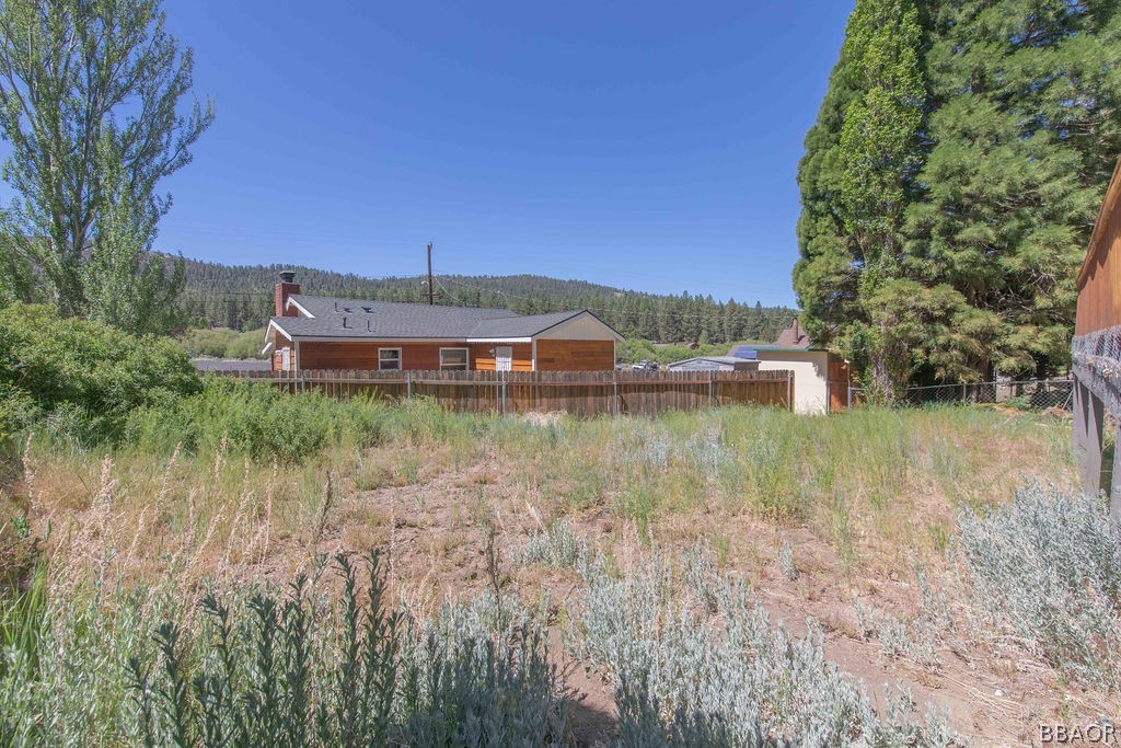 42897 Encino Road Big Bear Lake, CA 92315 - Photo 44 of 45 a view of a lake with a house in the background