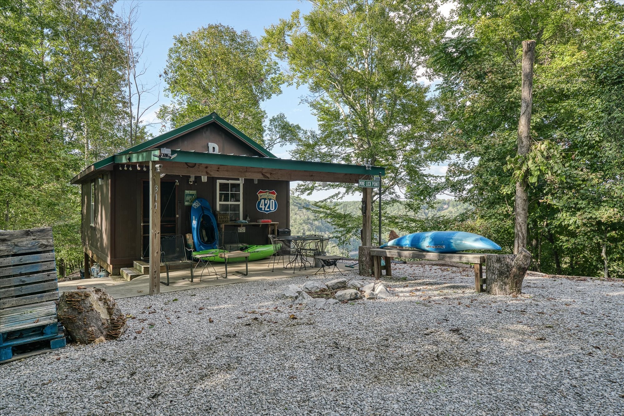 10035 Water Plant Road Baxter, TN 38544 - Photo 2 of 37 a front view of a house with garden