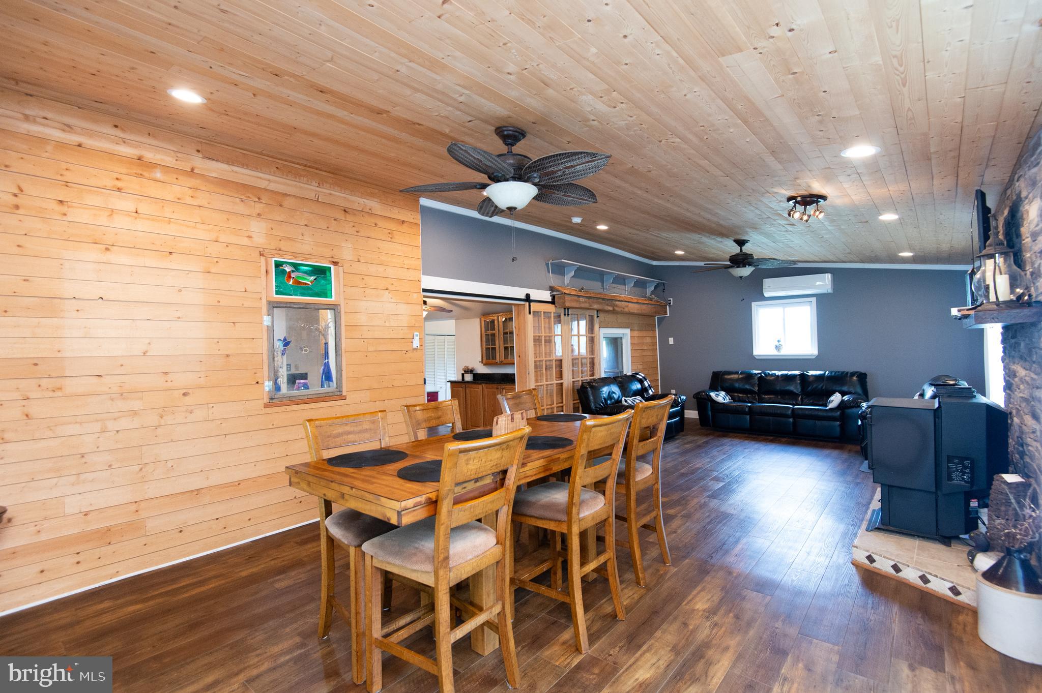 2407 Hoopers Island Road Fishing Creek, MD 21634 - Photo 21 of 69 Sunroom with wood wall