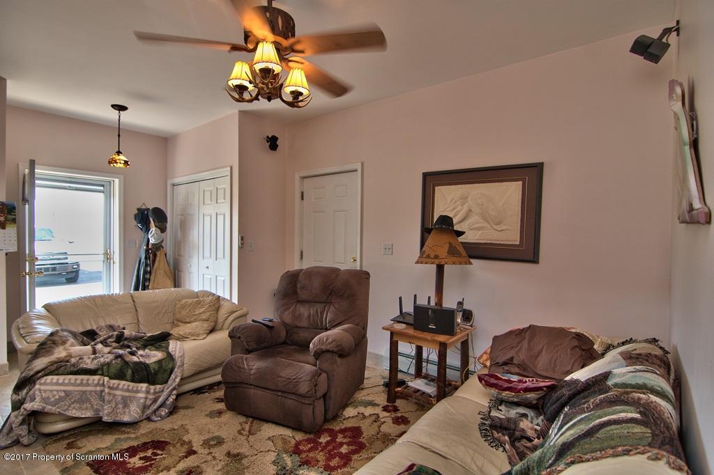 2325 Aberdeen Road Moscow, PA 18444 - Photo 5 of 43 a living room with furniture chess board and a couch