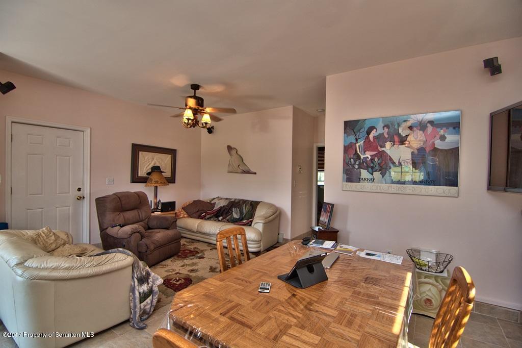 2325 Aberdeen Road Moscow, PA 18444 - Photo 7 of 43 a bedroom with furniture and a chandelier