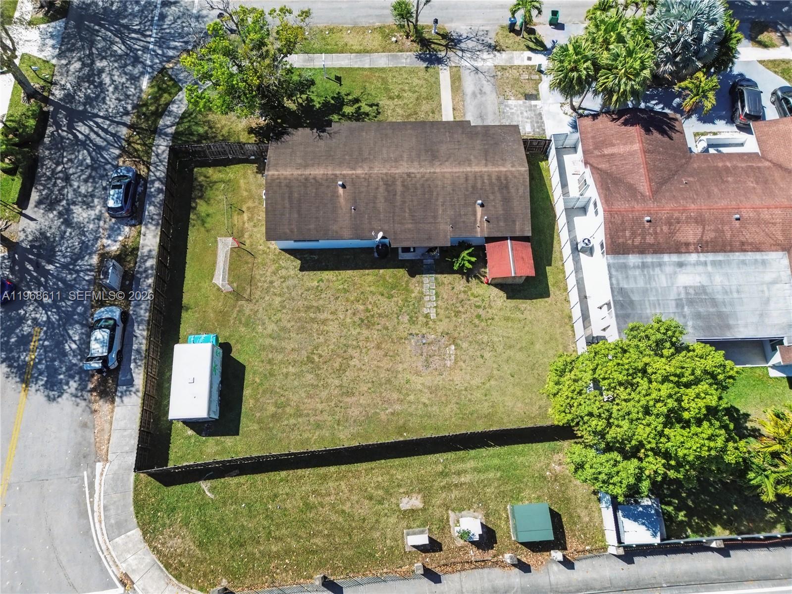 10491 Southwest 122nd Court Miami, FL 33186 - Photo 19 of 25 front view of a house with a yard