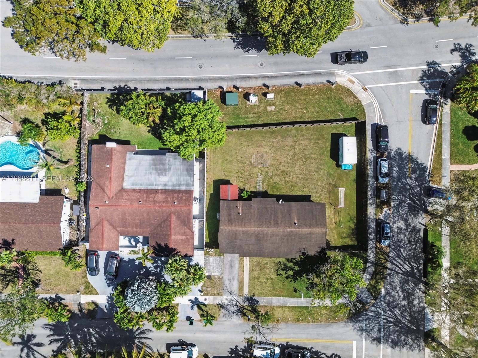 10491 Southwest 122nd Court Miami, FL 33186 - Photo 22 of 25 an aerial view of a house with a yard and a outdoor seating