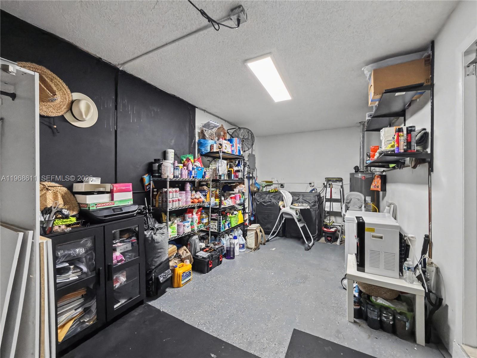 10491 Southwest 122nd Court Miami, FL 33186 - Photo 23 of 25 a view of a room with racks toys