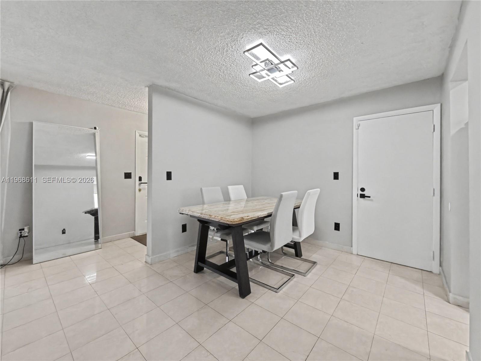 10491 Southwest 122nd Court Miami, FL 33186 - Photo 6 of 25 a view of a workspace with furniture