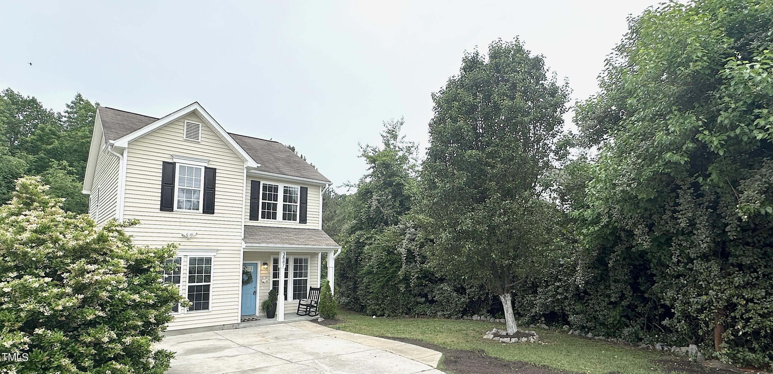 3847 Pin Oak Road Raleigh, NC 27604 - Photo 1 of 22 a front view of a house with a garden
