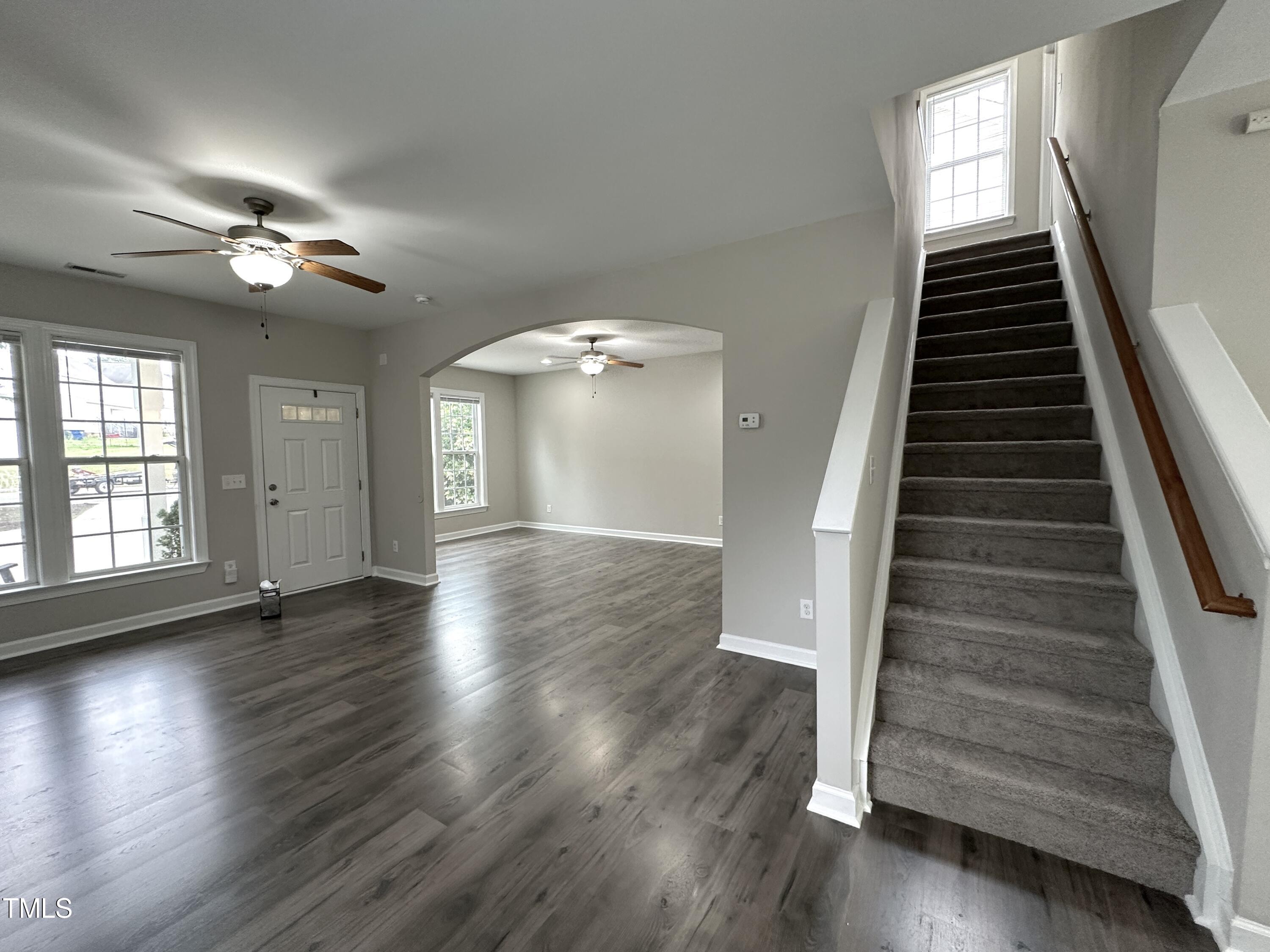 3847 Pin Oak Road Raleigh, NC 27604 - Photo 11 of 22 wooden floor in an empty room with a window