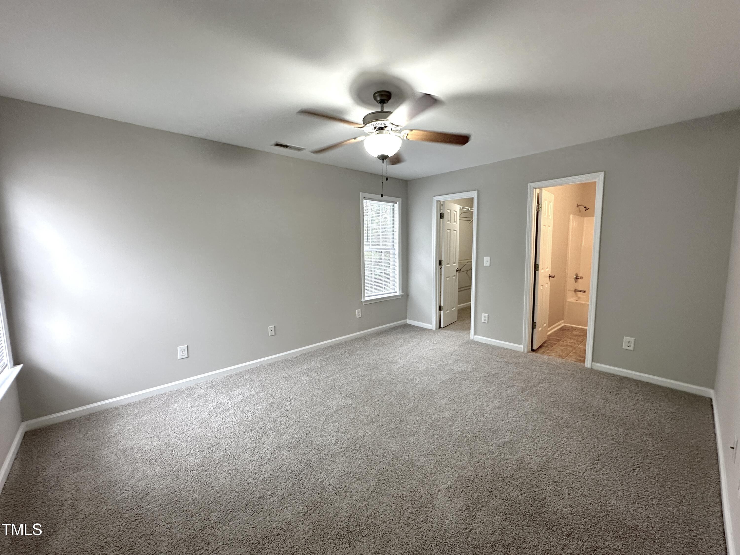 3847 Pin Oak Road Raleigh, NC 27604 - Photo 13 of 22 a view of an empty room with a window