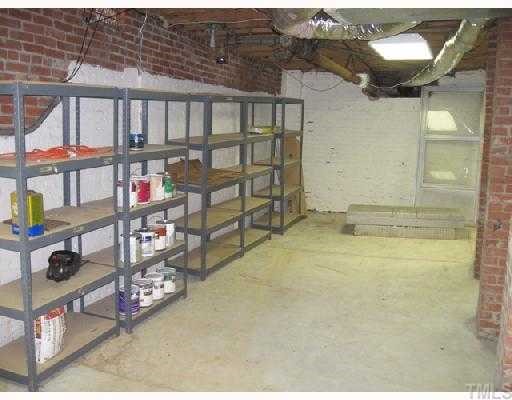 1826 Forest Road Durham, NC 27705 - Photo 12 of 12 The crawl space of this home has had a concrete floor poured throughout creating lots of great storage/work/workout space. With lighting and shelving this serves as a great flex space that you will find many uses for.
