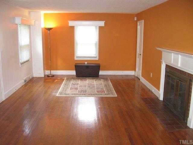 The living room is large and has a gas log fire place. Beautiful hardwood floors are throughout this bright clean and sold brick ranch. All window treatments will covey.