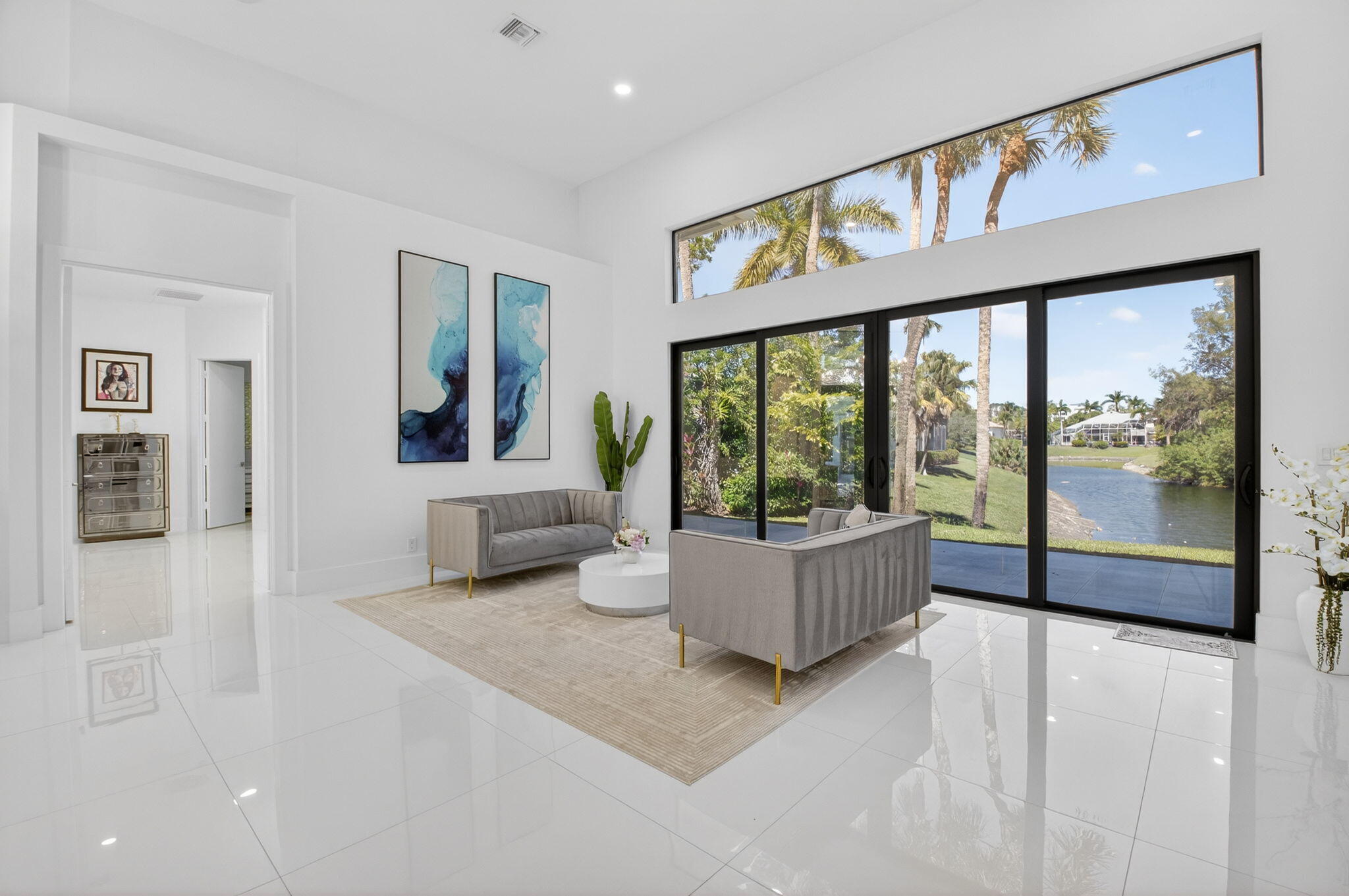 7075 Siena Court Boca Raton, FL 33433 - Photo 16 of 50 a living room with furniture and large window
