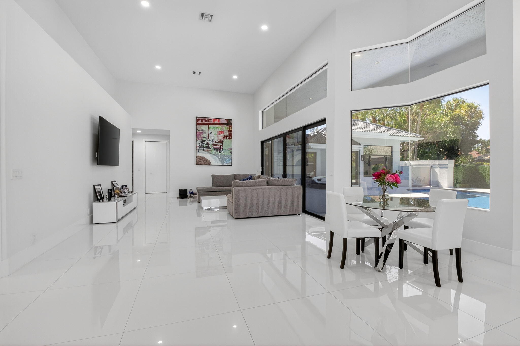 7075 Siena Court Boca Raton, FL 33433 - Photo 21 of 50 a living room with furniture and a flat screen tv