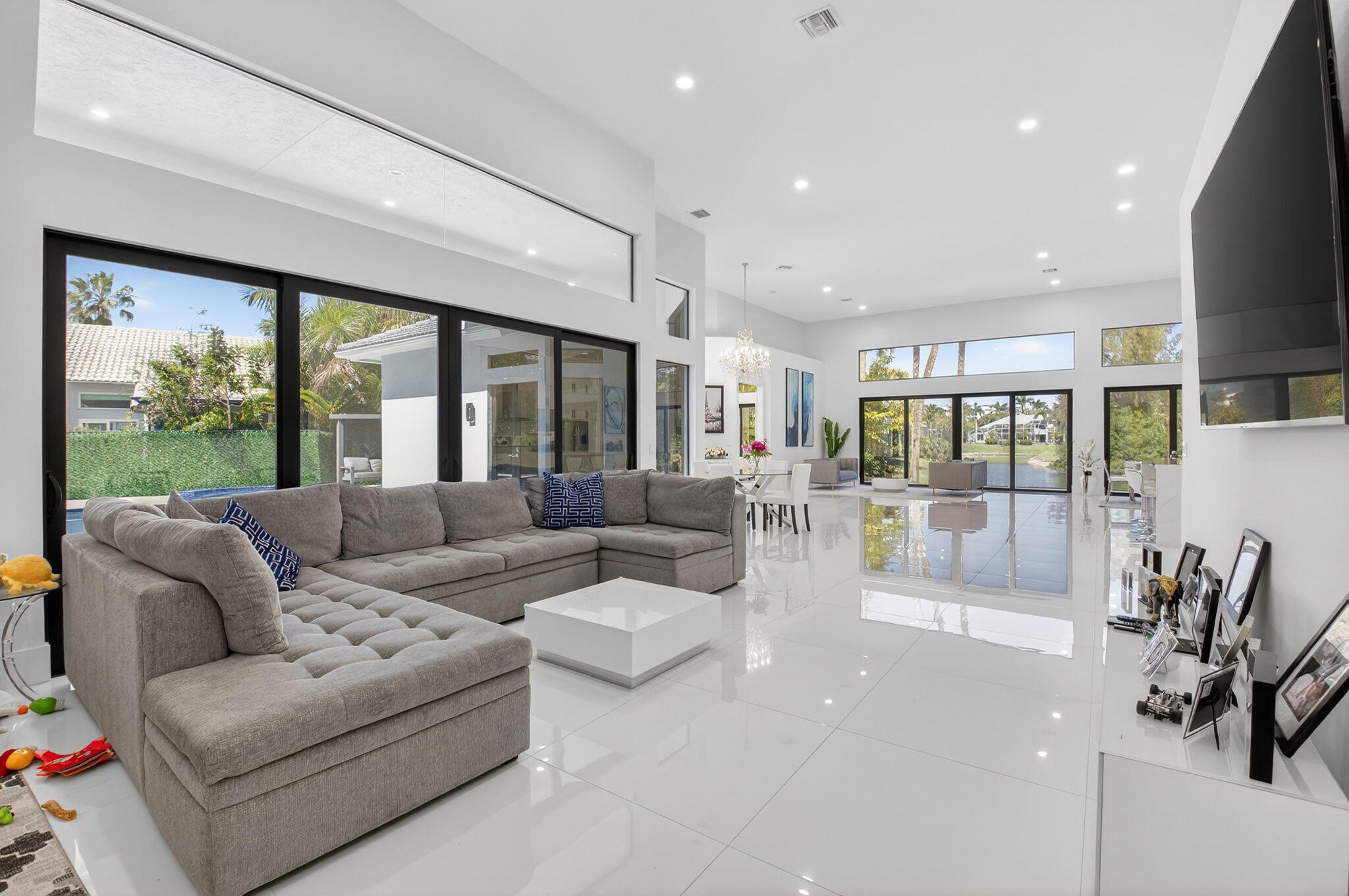 7075 Siena Court Boca Raton, FL 33433 - Photo 24 of 50 a living room with furniture and a large window