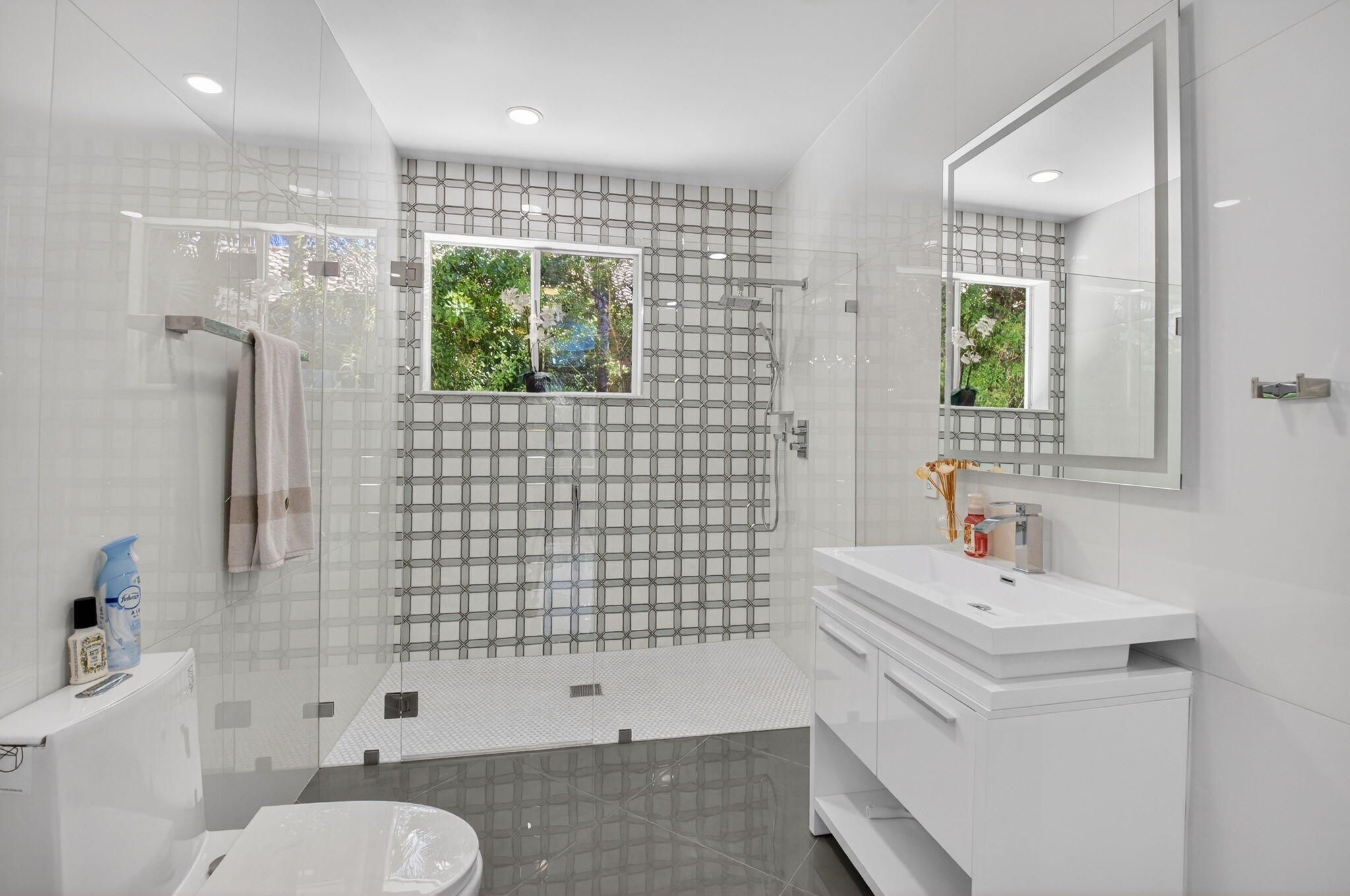7075 Siena Court Boca Raton, FL 33433 - Photo 37 of 50 a bathroom with a sink a toilet and shower