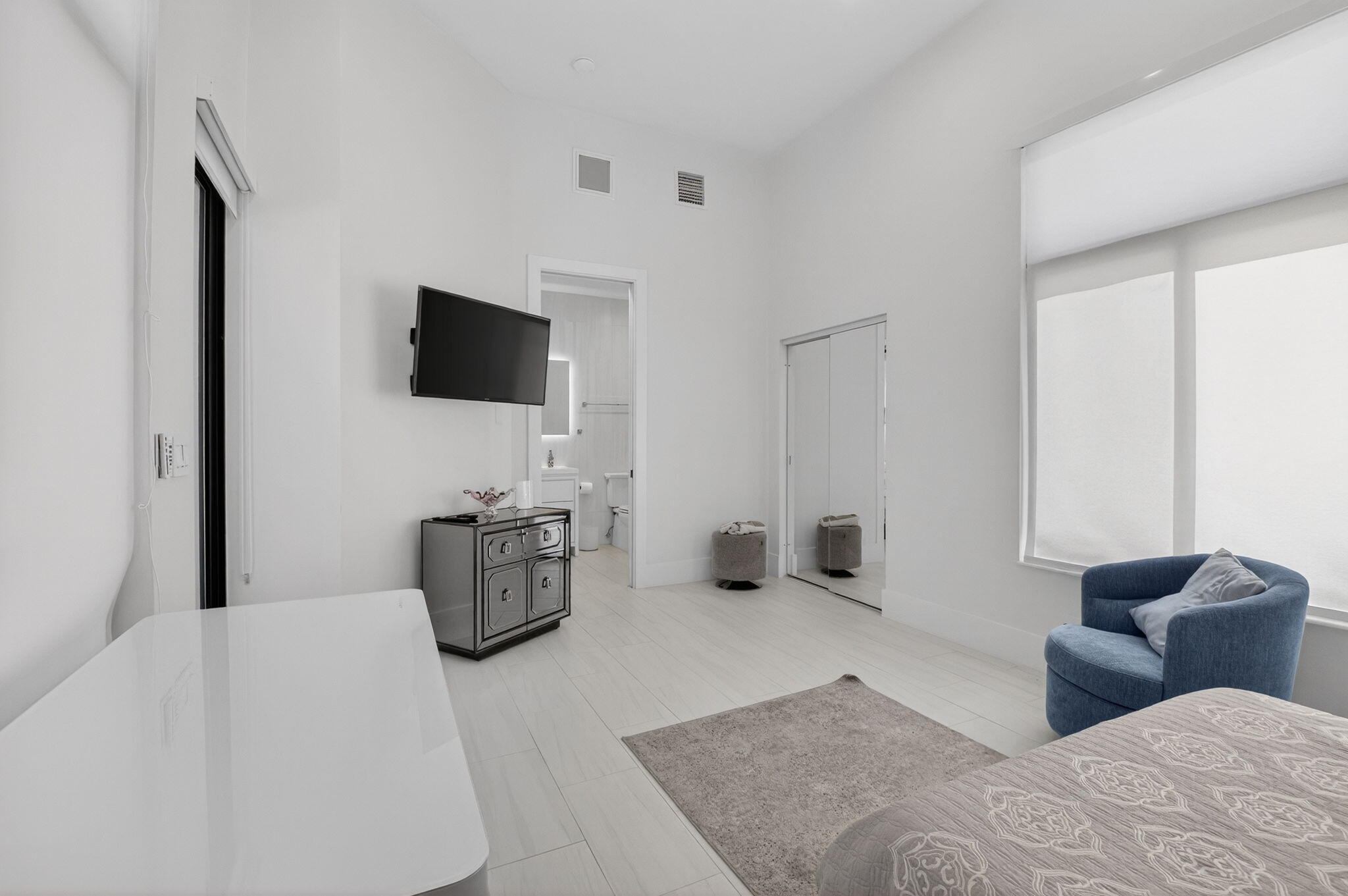 7075 Siena Court Boca Raton, FL 33433 - Photo 43 of 50 a living room with furniture and a flat screen tv