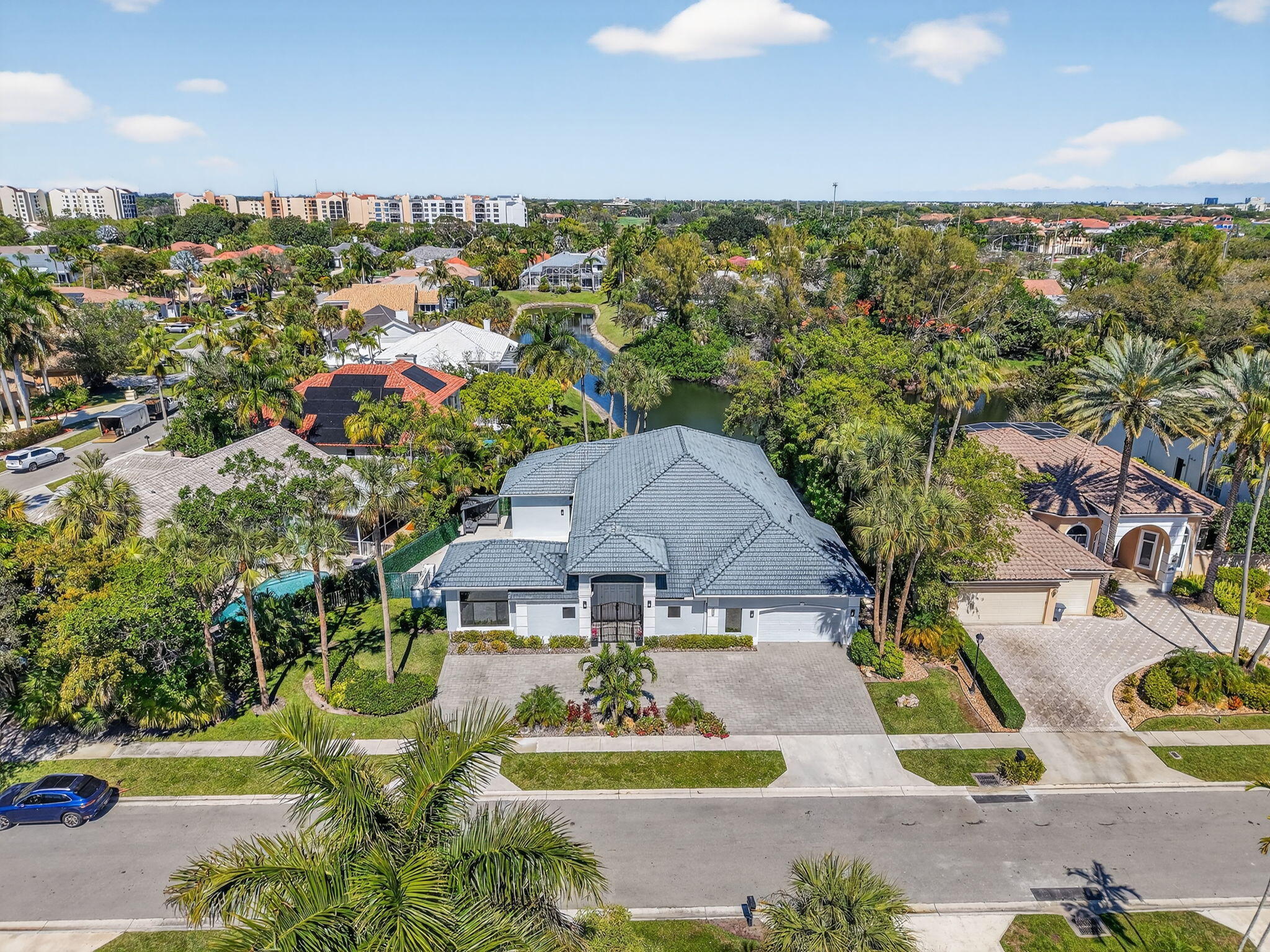 7075 Siena Court Boca Raton, FL 33433 - Photo 46 of 50 an aerial view of residential houses with outdoor space and swimming pool