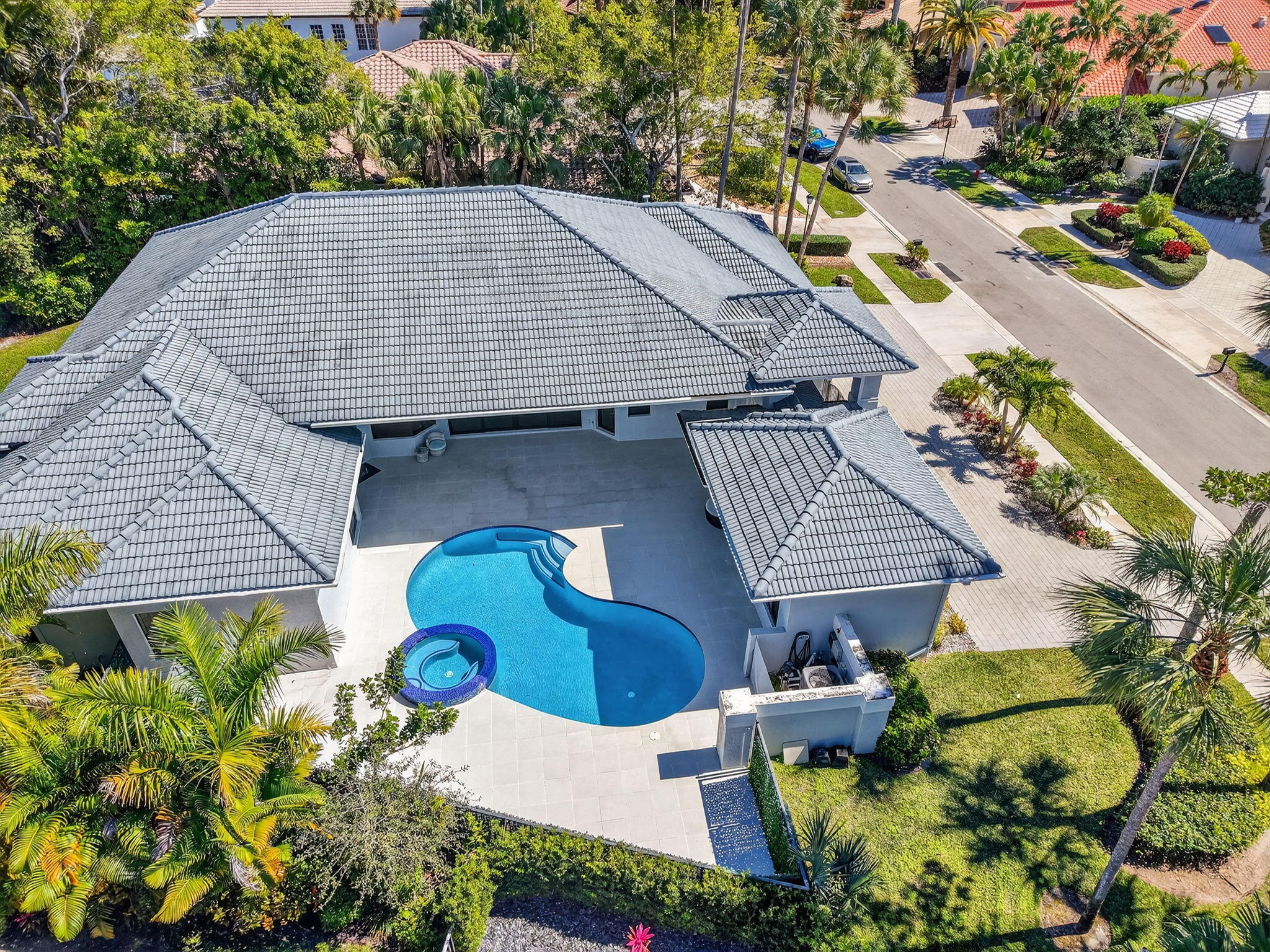7075 Siena Court Boca Raton, FL 33433 - Photo 47 of 50 an aerial view of a house with a yard and potted plants