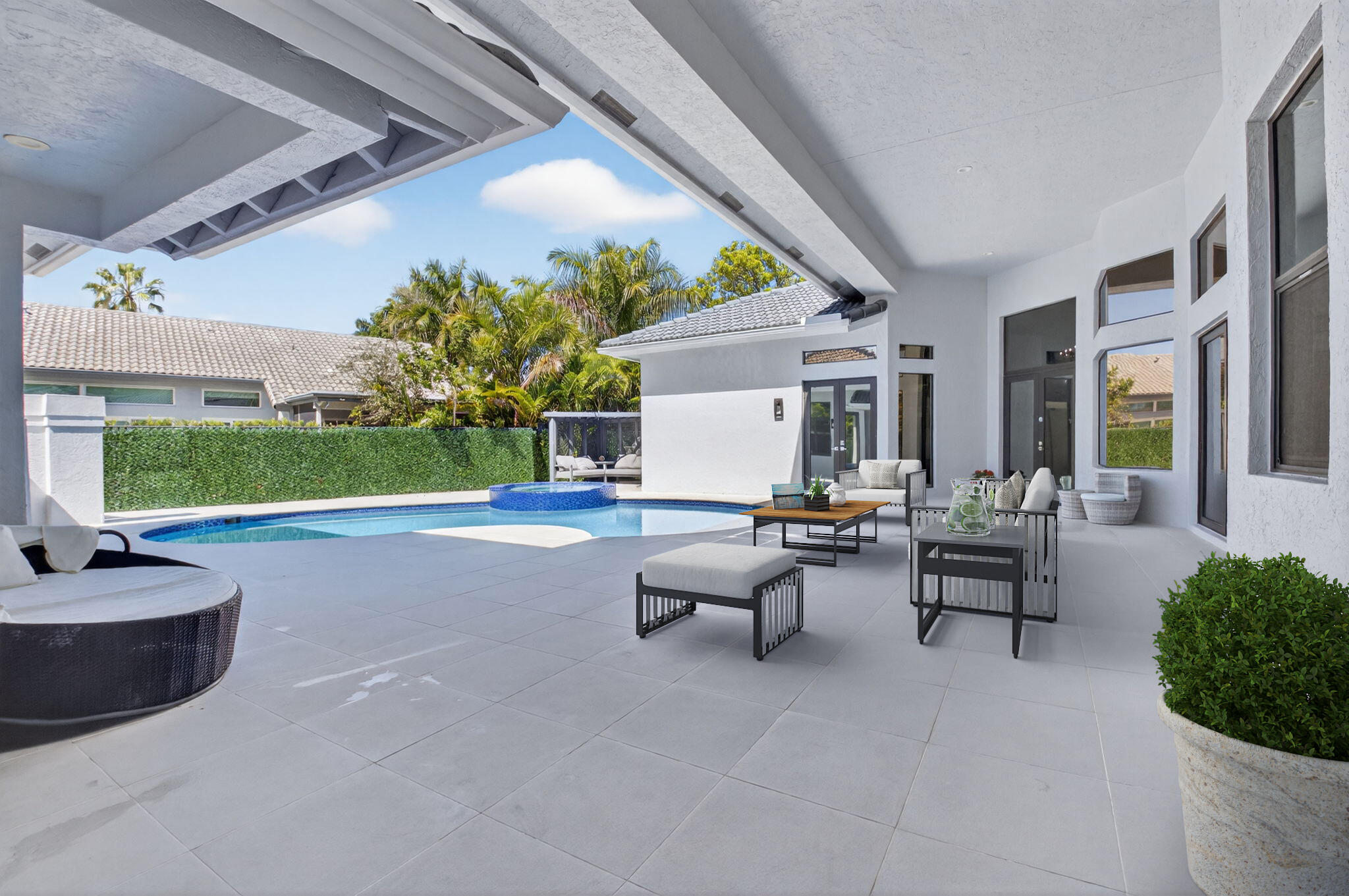 7075 Siena Court Boca Raton, FL 33433 - Photo 6 of 50 a living room with furniture and a garden