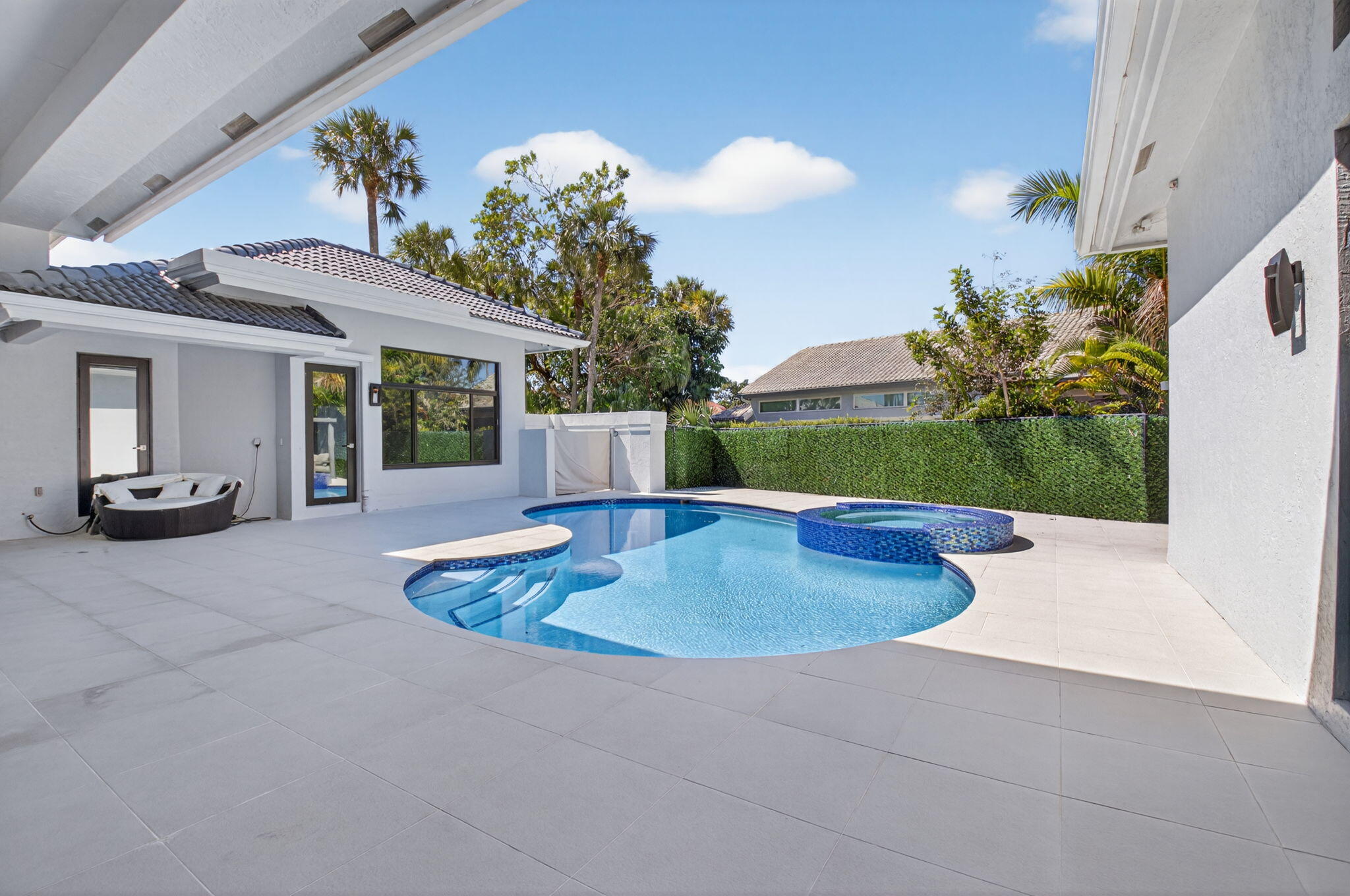 7075 Siena Court Boca Raton, FL 33433 - Photo 8 of 50 a view of kitchen with furniture and screen