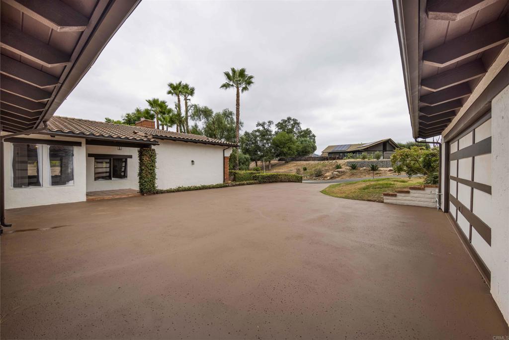 32404 Womsi Road Pauma Valley, CA 92061 - Photo 28 of 34 a view of a house with a street