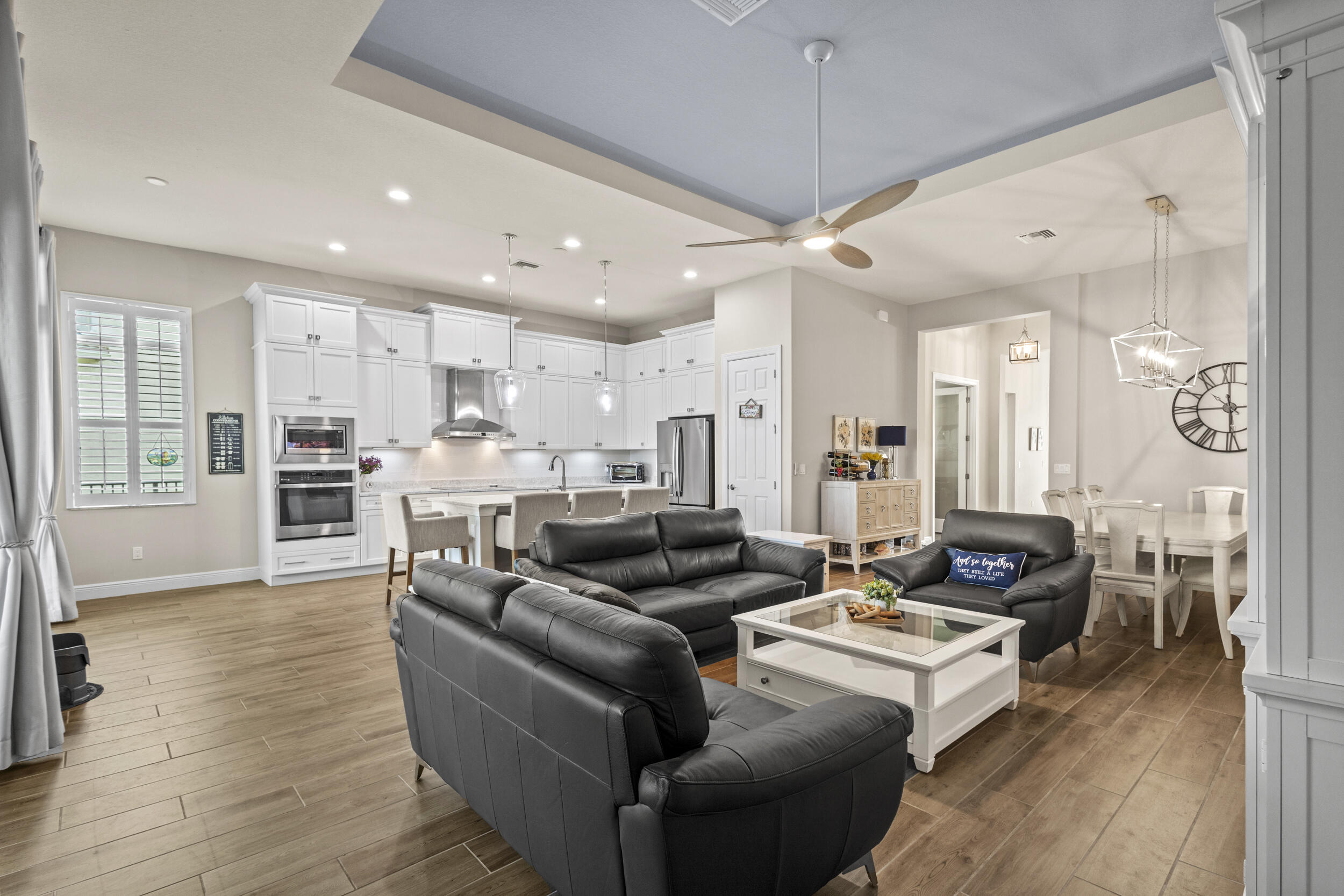 9242 Southwest Pepoli Way Port St. Lucie, FL 34987 - Photo 17 of 71 a living room with furniture and a wooden floor