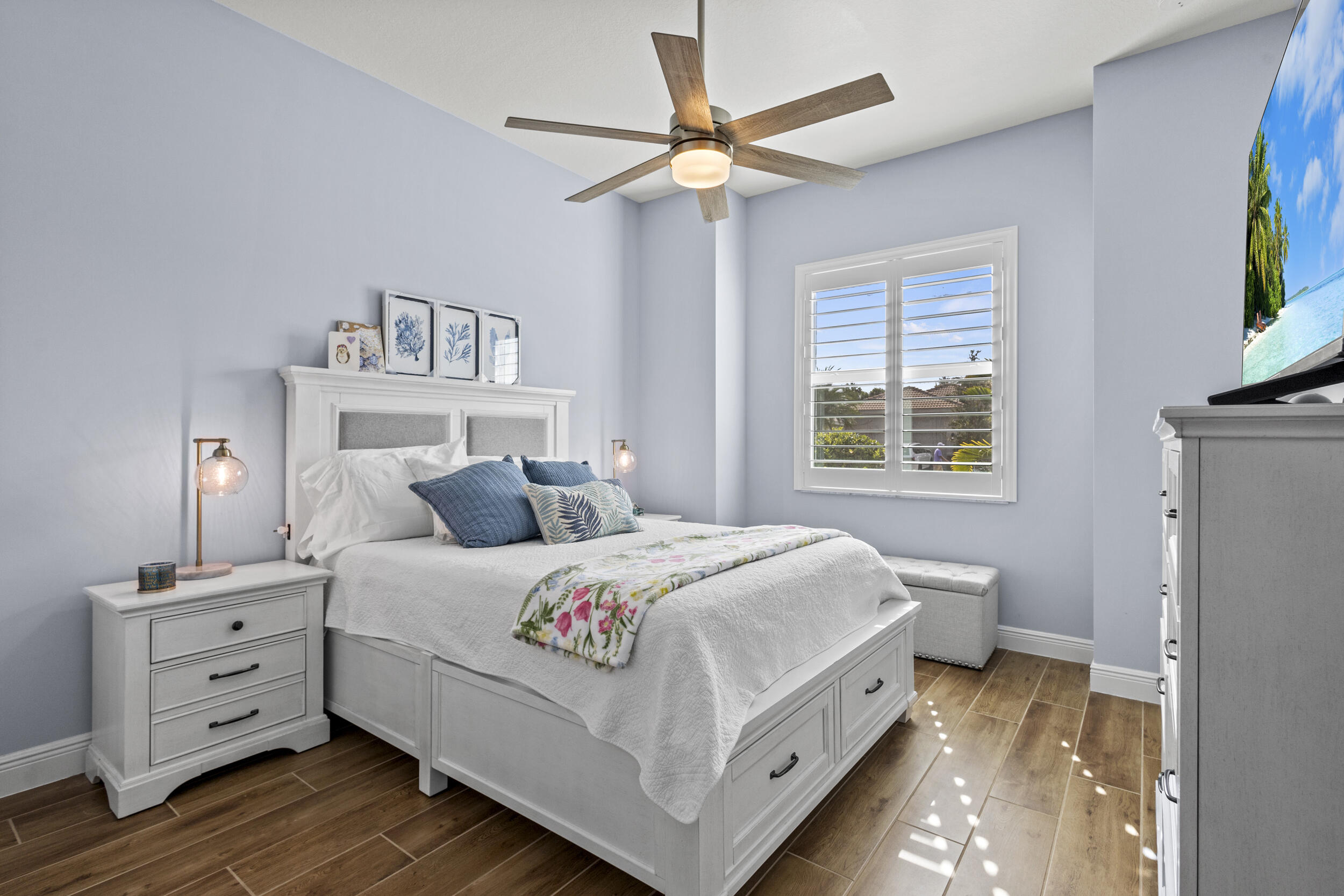 9242 Southwest Pepoli Way Port St. Lucie, FL 34987 - Photo 25 of 71 a room with a bed and a window