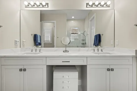 a view of a house with sitting area and garden