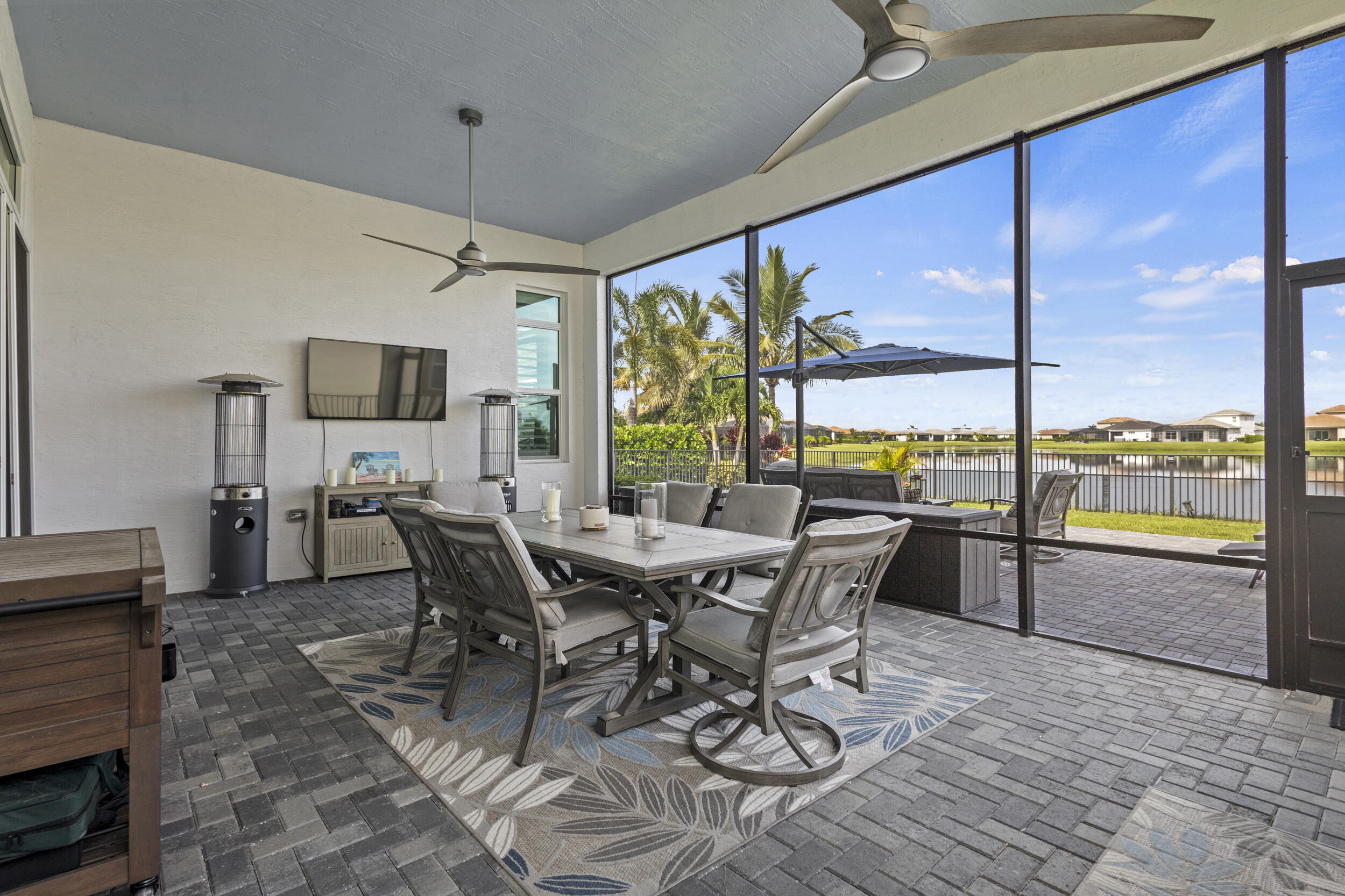 9242 Southwest Pepoli Way Port St. Lucie, FL 34987 - Photo 39 of 71 a view of a dining room with furniture window and outside view