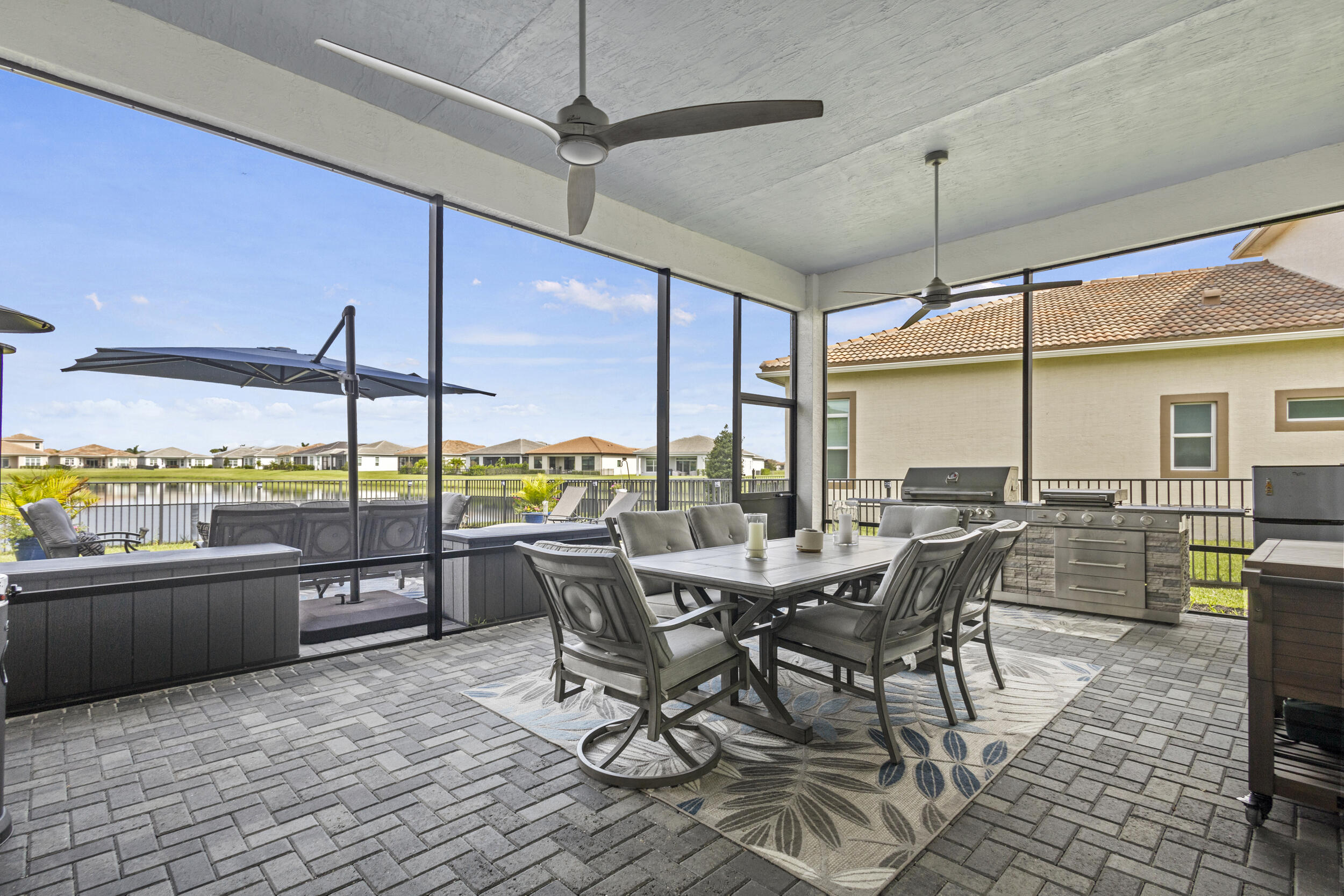 9242 Southwest Pepoli Way Port St. Lucie, FL 34987 - Photo 40 of 71 a view of a dining room with furniture window and wooden floor