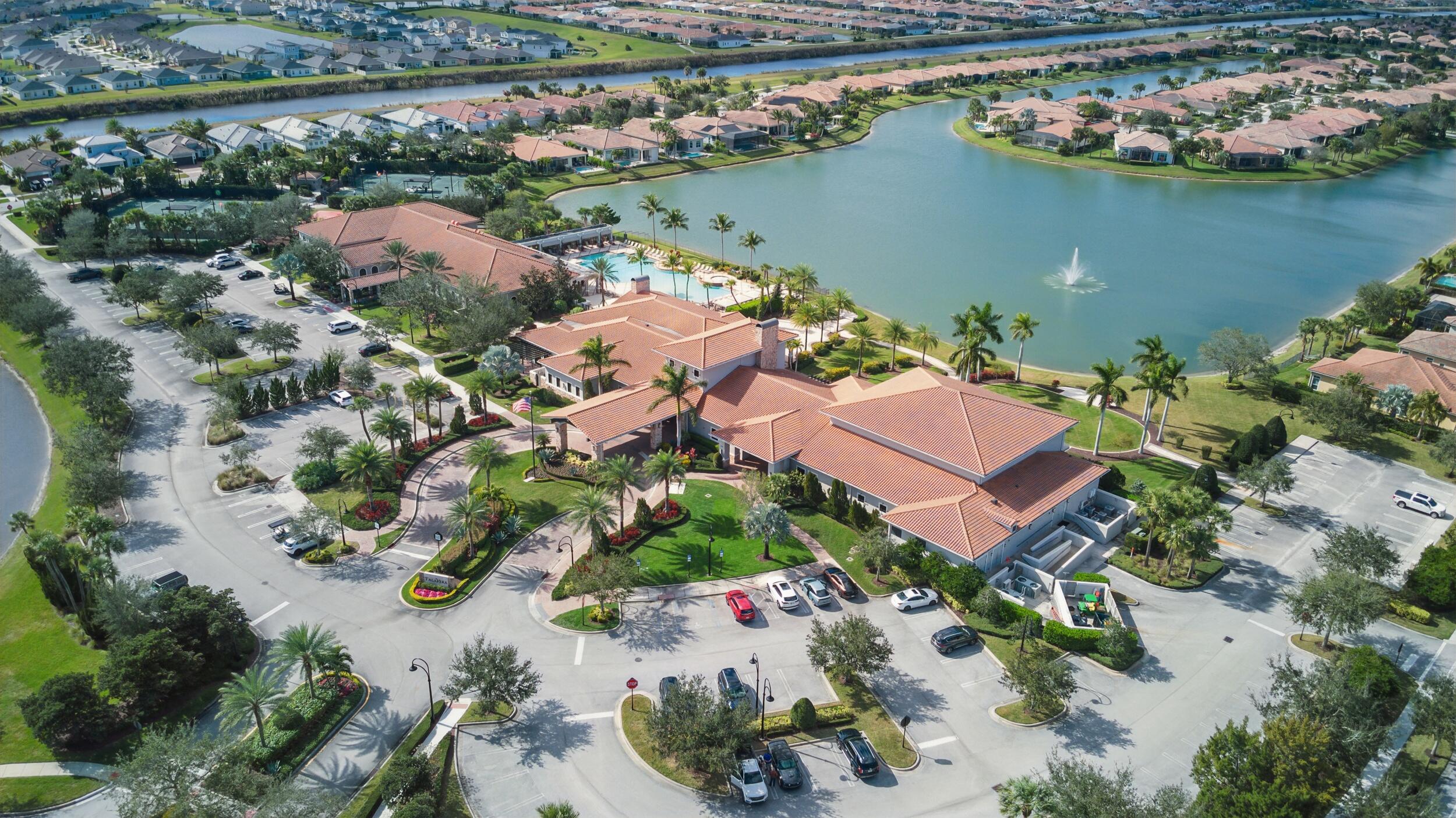 9242 Southwest Pepoli Way Port St. Lucie, FL 34987 - Photo 67 of 71 an aerial view of lake residential house with outdoor space