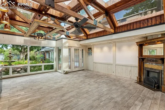 a view of an empty room with a fireplace