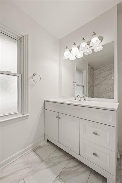 759 Smyrna Road Southwest Conyers, GA 30094 - Photo 18 of 25 a bathroom with a sink and a mirror