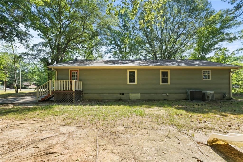 759 Smyrna Road Southwest Conyers, GA 30094 - Photo 23 of 25 a backyard of a house