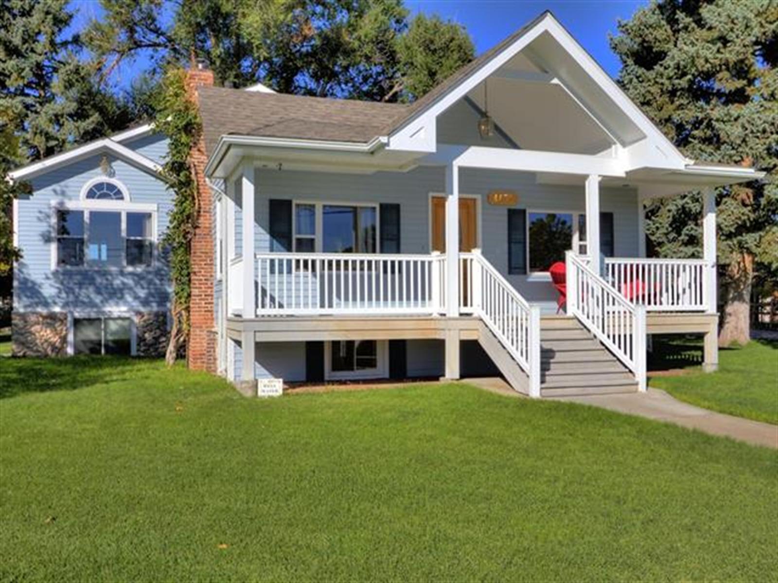 4875 Eldridge Street Golden, CO 80403 - Photo 1 of 1 a front view of a house with a yard