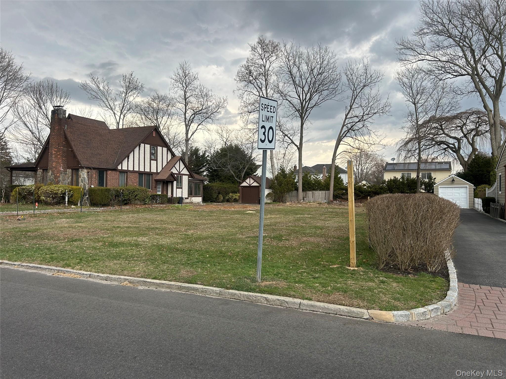 Sunset Road Bay Shore, NY 11706 - Photo 2 of 6 a view of a house with a yard