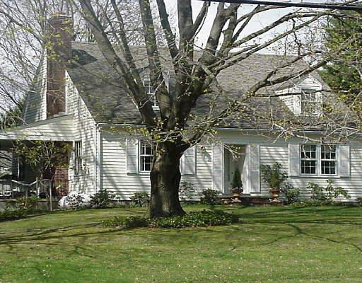46 Queen Street Newtown, CT 06470 - Photo 1 of 1 a front view of house with yard