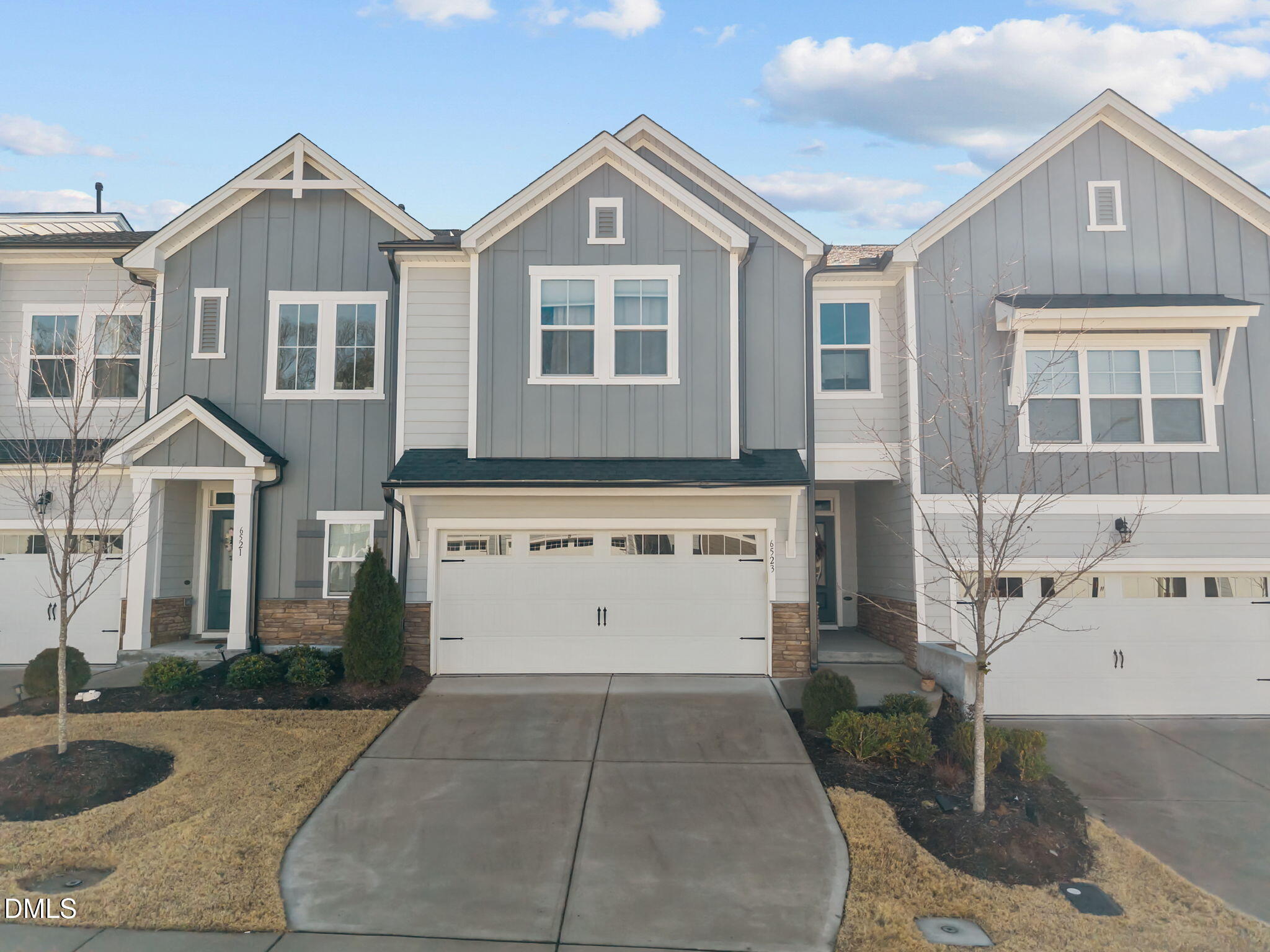 6523 Amber Springs Drive Durham, NC 27713 - Photo 1 of 32 a front view of a house with entertaining space