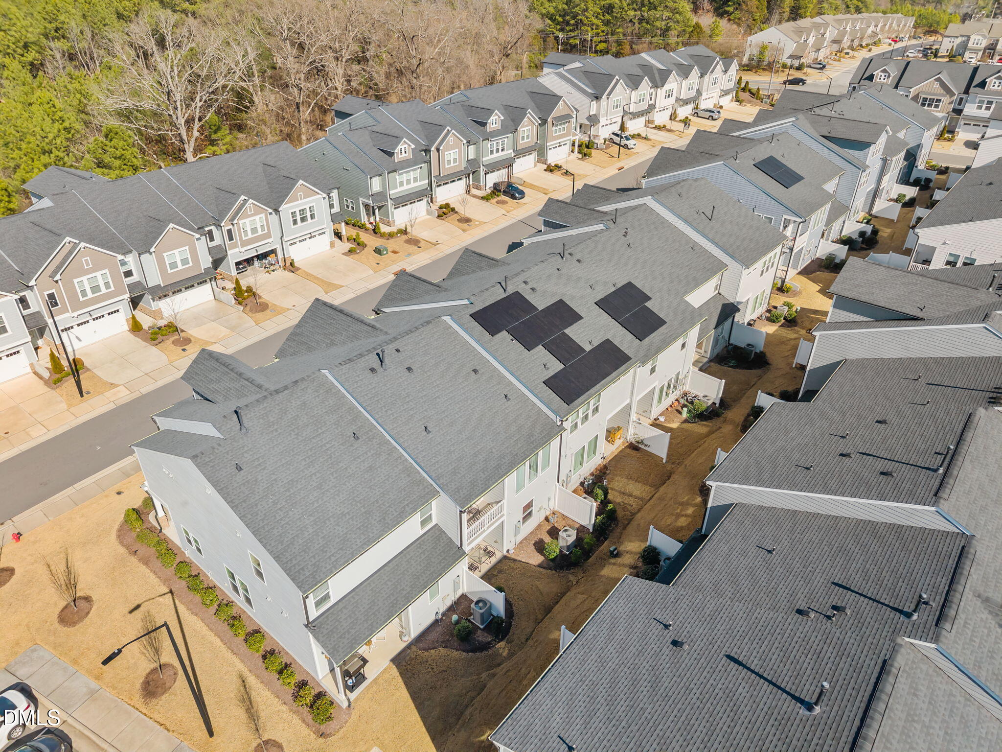 6523 Amber Springs Drive Durham, NC 27713 - Photo 30 of 32 an aerial view of residential houses with outdoor space