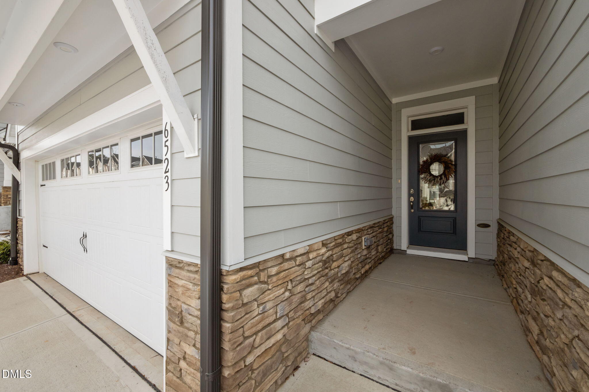 6523 Amber Springs Drive Durham, NC 27713 - Photo 4 of 32 a view of front door of house