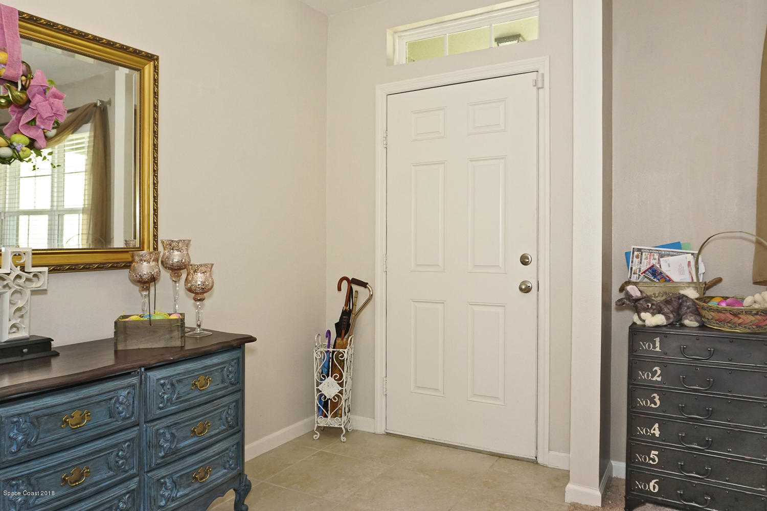 4637 Amaca Bay Lane Melbourne, FL 32935 - Photo 4 of 52 a view of room with closet and mirror