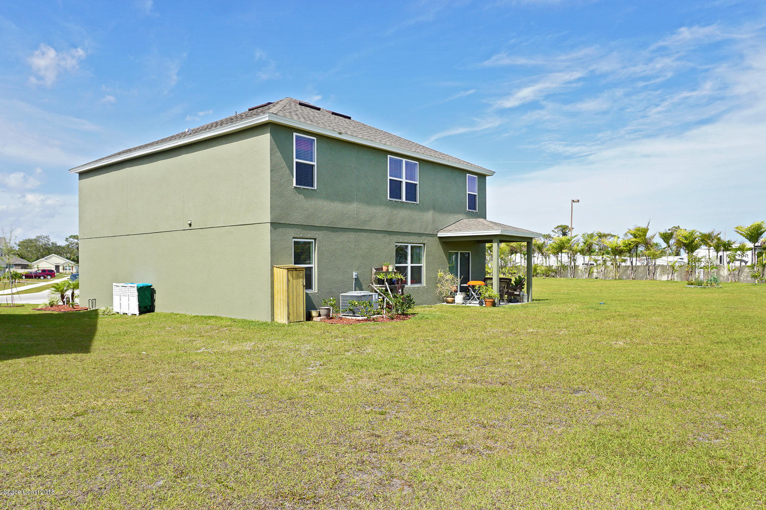 4637 Amaca Bay Lane Melbourne, FL 32935 - Photo 47 of 52 a house view with swimming pool in front of it