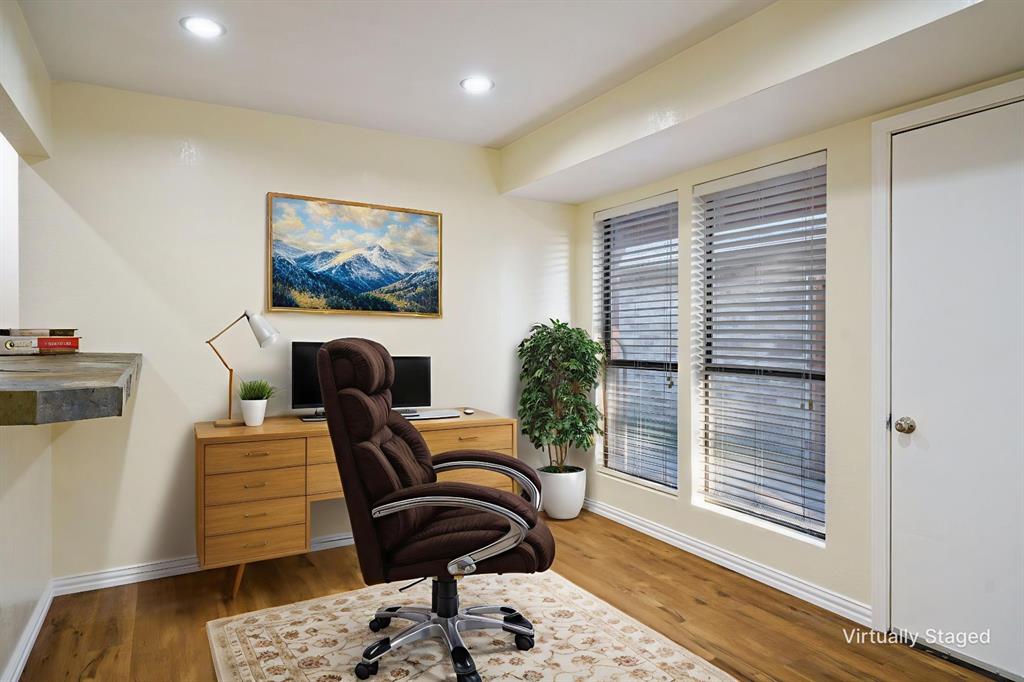 6512 Mc Cormick Ranch Court Plano, TX 75023 - Photo 16 of 40 a view of a workspace with furniture and a window