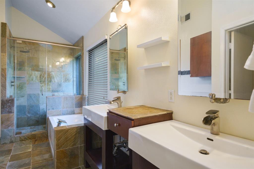 6512 Mc Cormick Ranch Court Plano, TX 75023 - Photo 2 of 40 a bathroom with a sink and a mirror