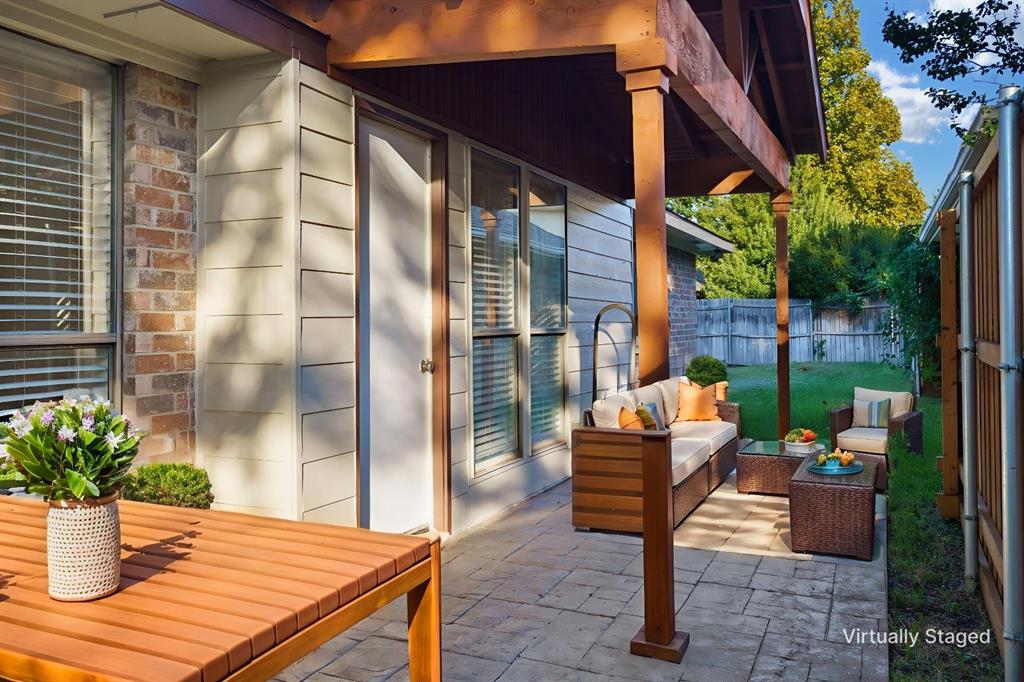 6512 Mc Cormick Ranch Court Plano, TX 75023 - Photo 24 of 40 a outdoor space with the couches and a potted plant