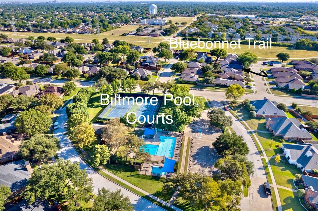 6512 Mc Cormick Ranch Court Plano, TX 75023 - Photo 6 of 40 an aerial view of water body with residential house outdoor space and swimming pool